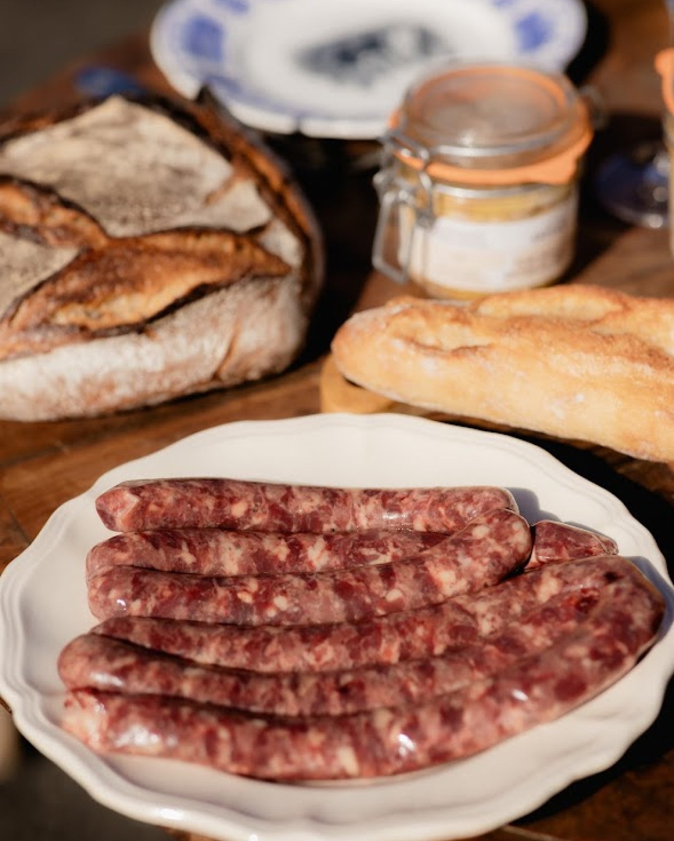 Saucisses De Porc Confites